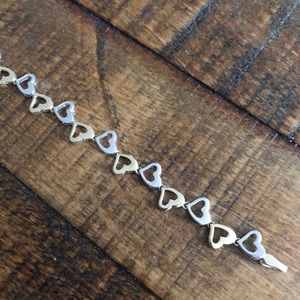 Silver and gold heart bracelet